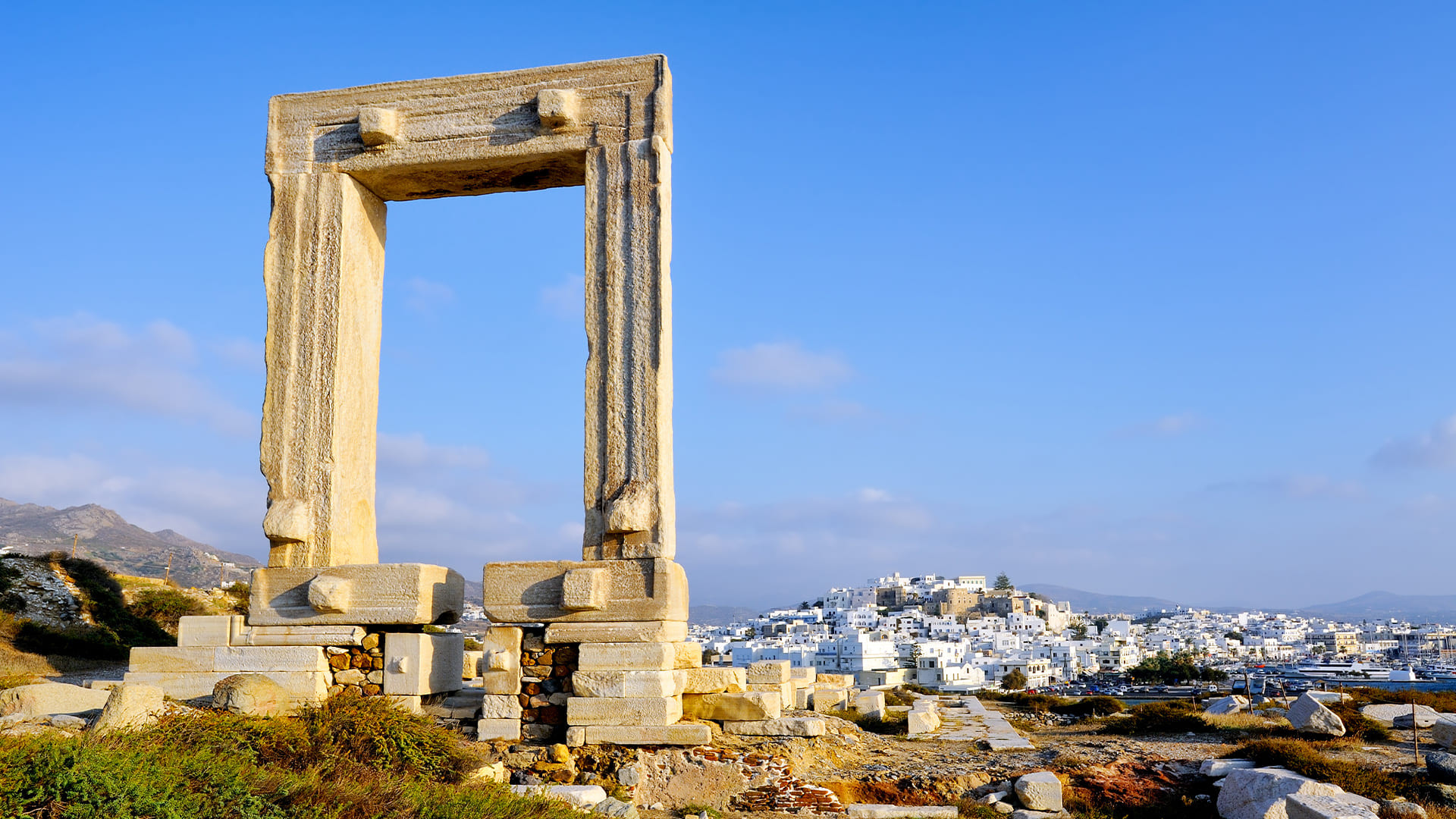 Rock arch at the sea's edge - Cyclades - Greece