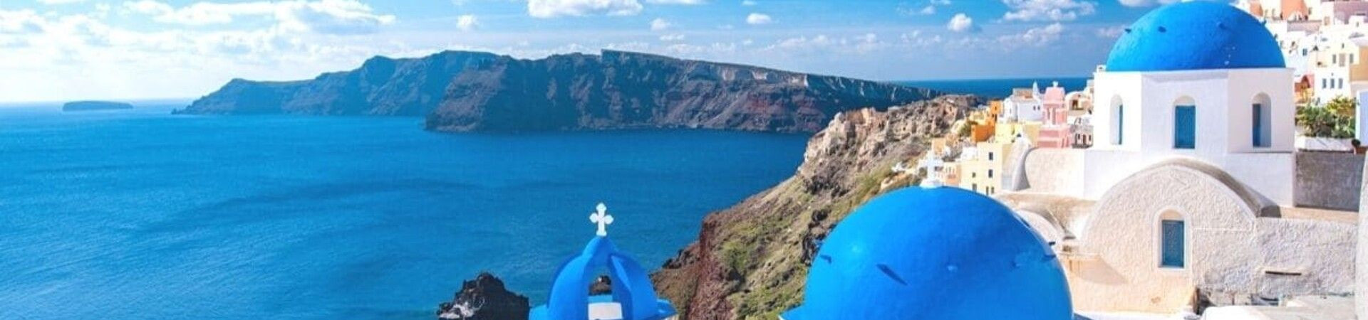Blue-domed churches overlooking the caldera - Oia - Santorini - Greece