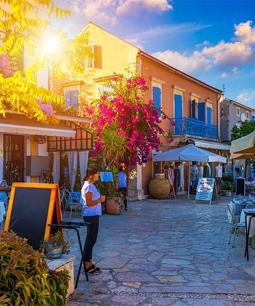 Colourful harbour and tavernas at the water's edge - Fiskardo, Kefalonia - Greece