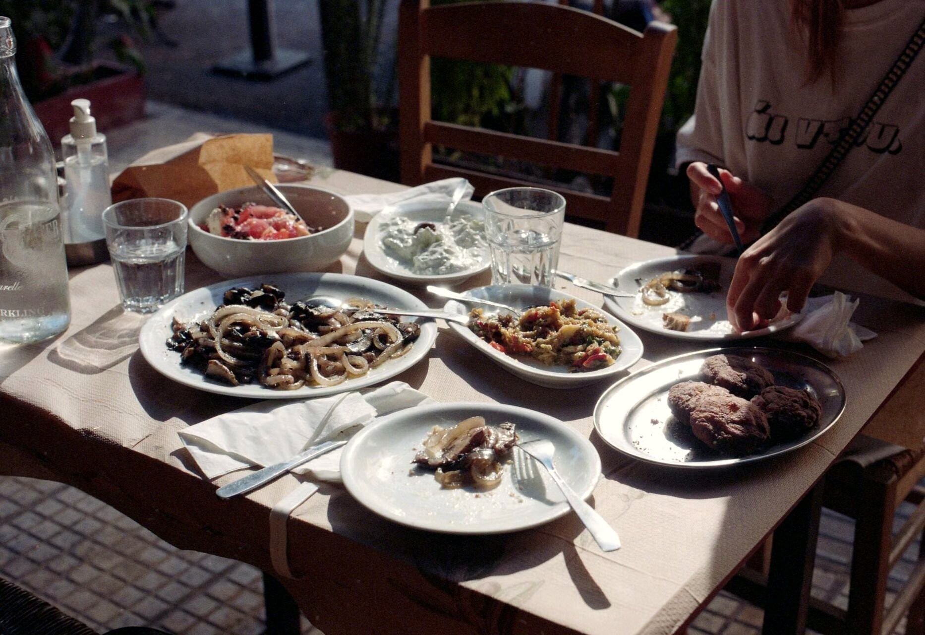Greek taverna table with meze to share