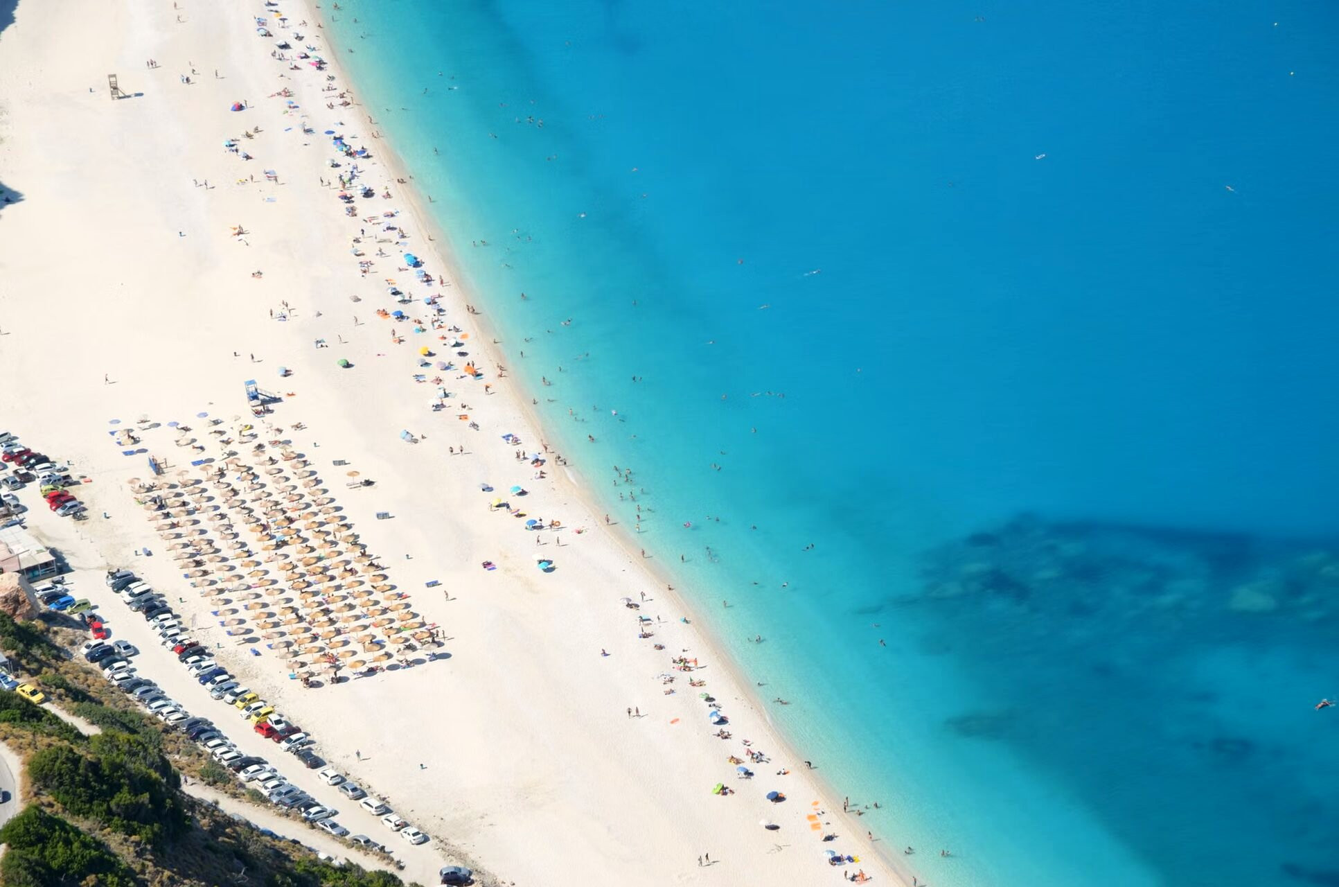 Long sandy beach and turquoise water - West coast of Lefkada, Greece