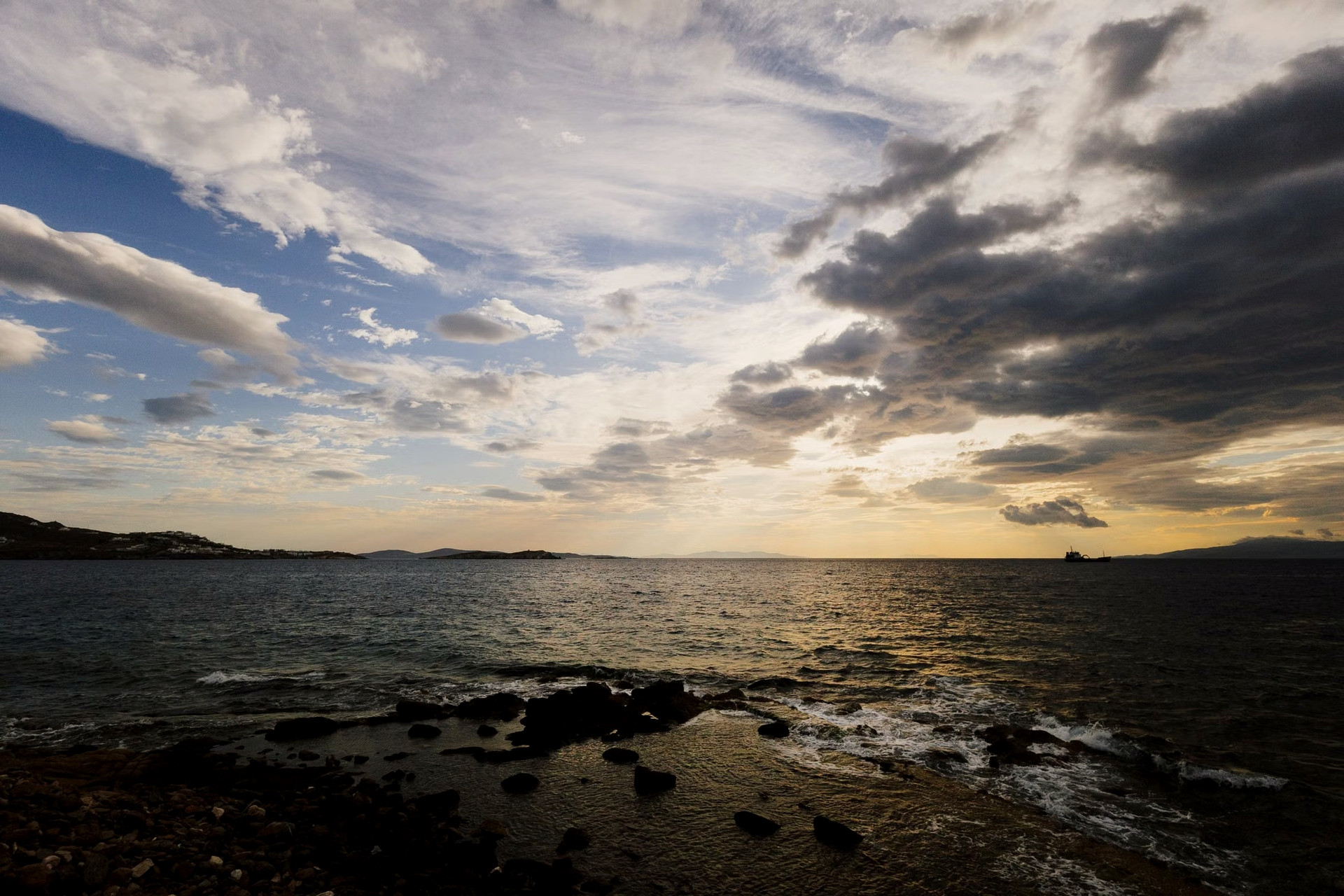 Cloudy sky at dusk over the Aegean Sea in winter - Greece