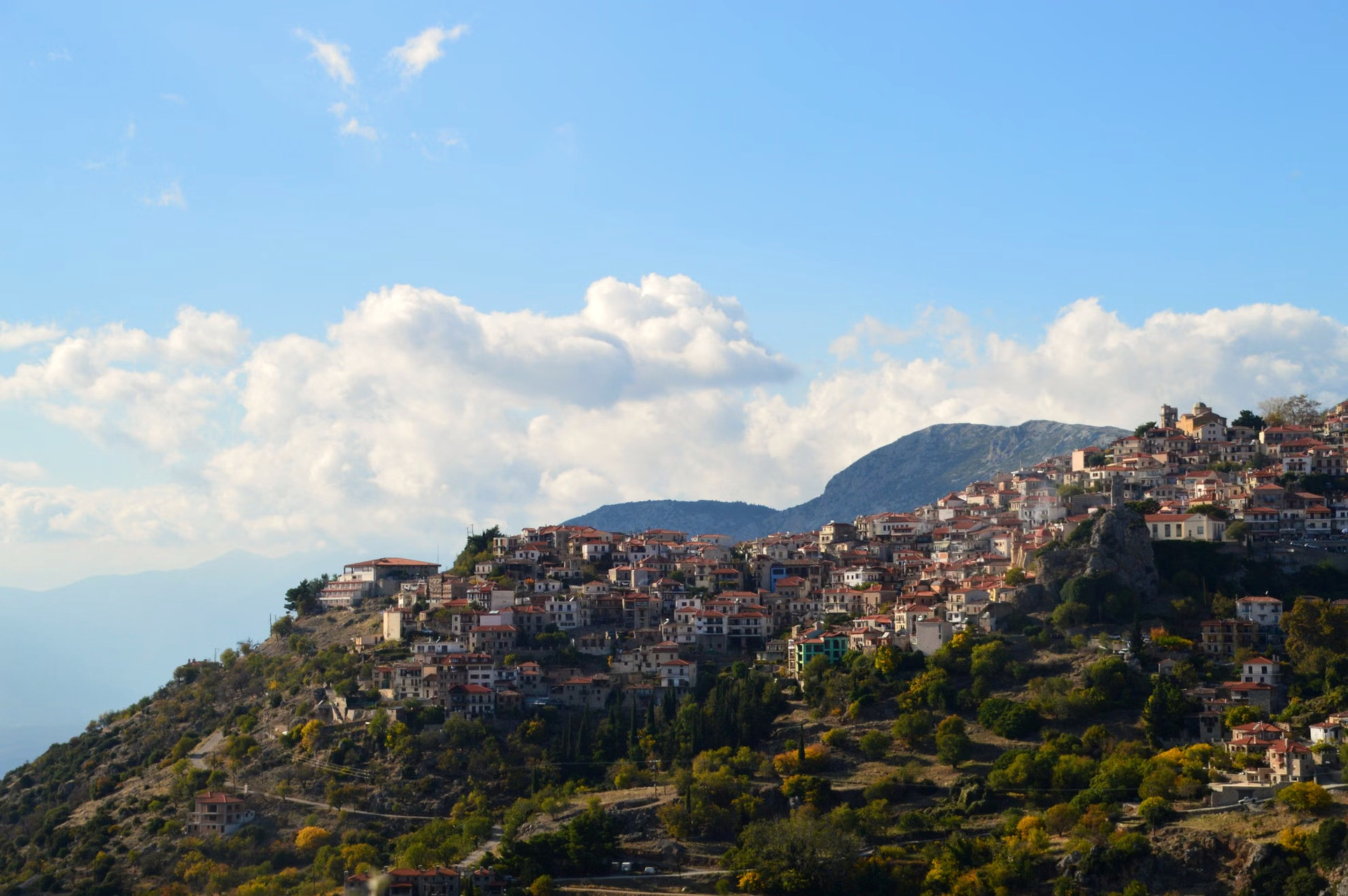 Mountain village clinging to its hillside - mainland Greece