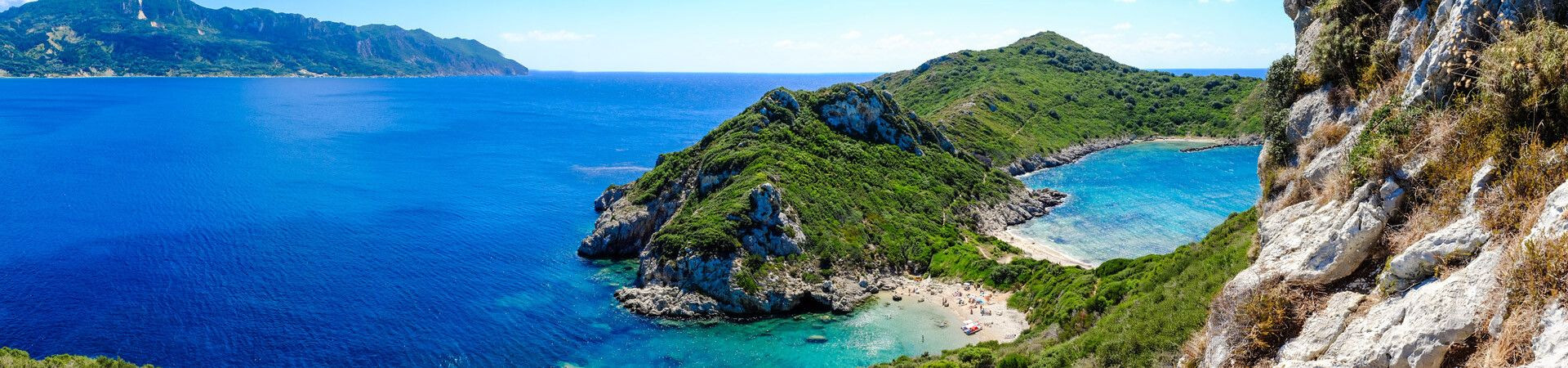Turquoise bay and green hills of Porto Timoni - Corfu - Greece