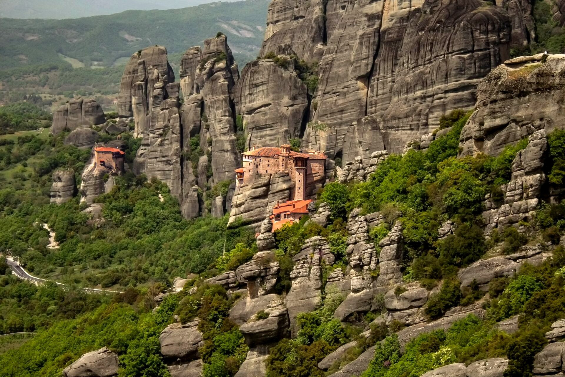 Roussanou monastery on its rocky spur surrounded by pines - Meteora, Greece